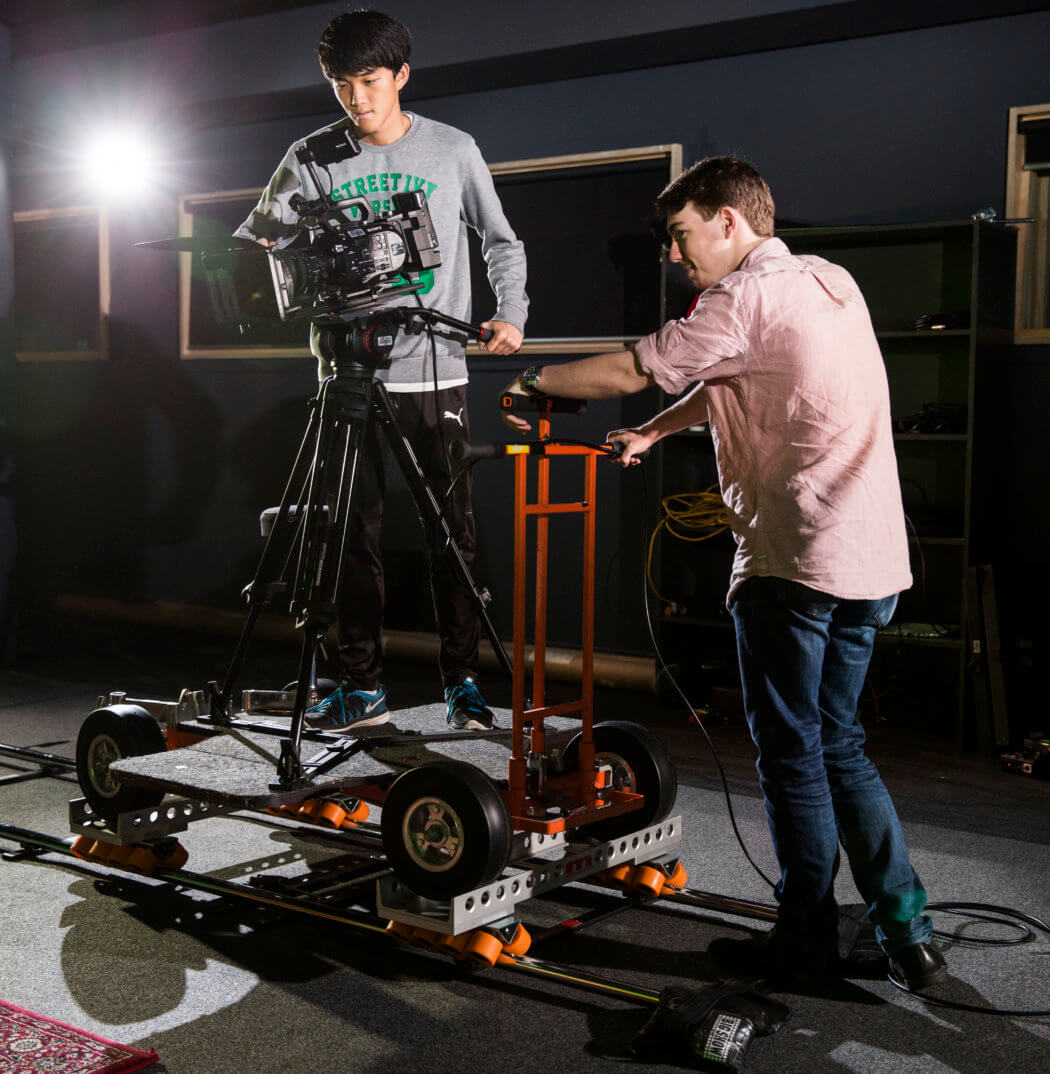 Film Students Filming with Film Equipment