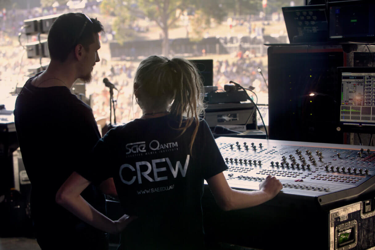 SAE_AUS_Image_Workplacement_Splendour_Male_and_Female_students_on_Audio_desk_304231948 Students working at Splendour in the Grass festival